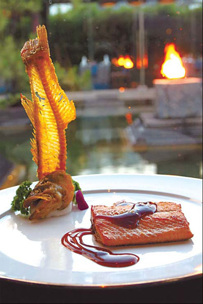 Flaky trout fillet served at Bai Yun, the Banyan Tree Lijiang, features fresh Lijiang trout.