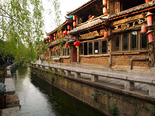 Lijiang Ancient Town is a must-see destination for Lijiang tours, Yunnan tours or Chinese ethnic tribe tours.