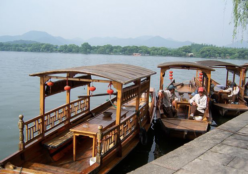 West Lake boat trip is very popular by tourists.