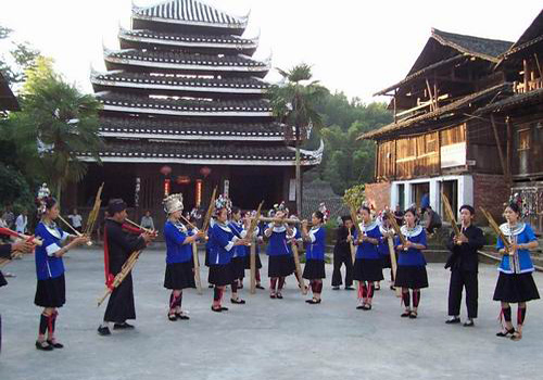 Dong people sing and dance at their ethnic festival.