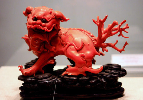 A precious handicraft carved from red coral is collected in the Forbidden City.