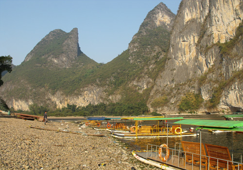 Bamboo rafts are berthing at the shoal of Li River.