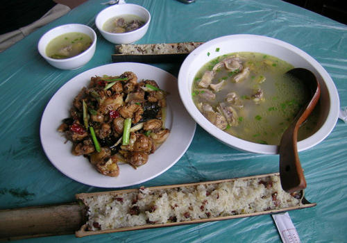 Local chicken soup, fried chicken with chillis and rice cooked inside bamboo tube are featured food in the local villages in the Dragon's Backbone Rice Terraces, Longsheng, Guilin.