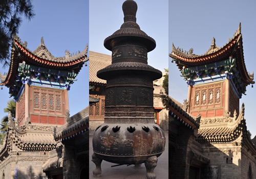 The bell and drum towers and a big censer inside the Eight Immortal Taoist Temple.