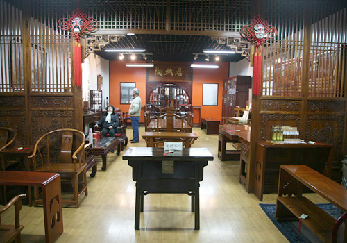 Traditional furniture are sold in Panjiayuan.