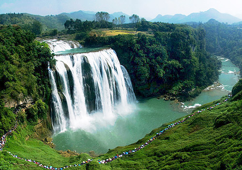 The grand Huangguoshu Waterfall is 67 meters high and 83.3 meters wide.