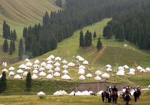 The local and their white yurts in the South Pastrue orNanshan Scenic Area in Urumqi.