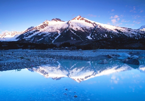 The clear reflection of snow mountain in Karakuri Lake,Kashgar