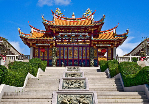 The paved paths comprising six staircases, embedded bluestone auspicious reliefs in the middle stretches to the gate.  